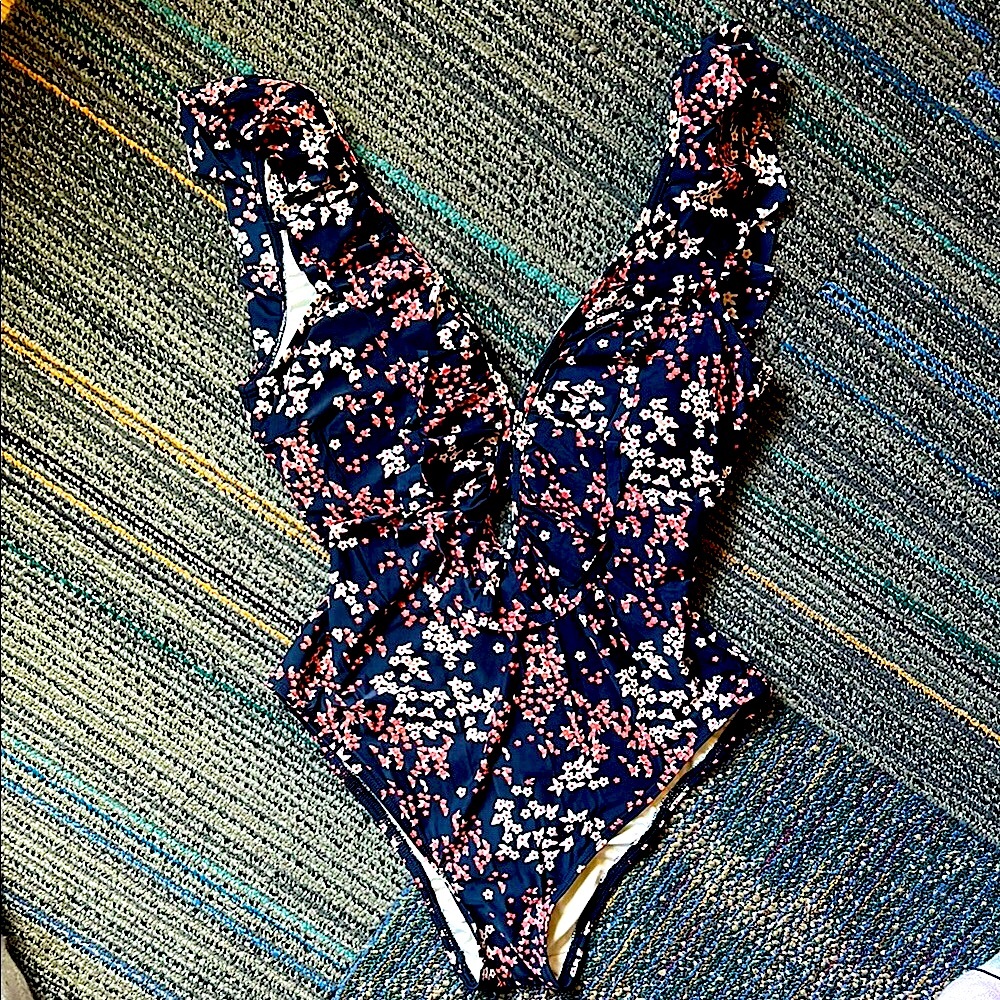 Michael Kors Gorgeous Floral Ruffle Backless One Piece with front cut out